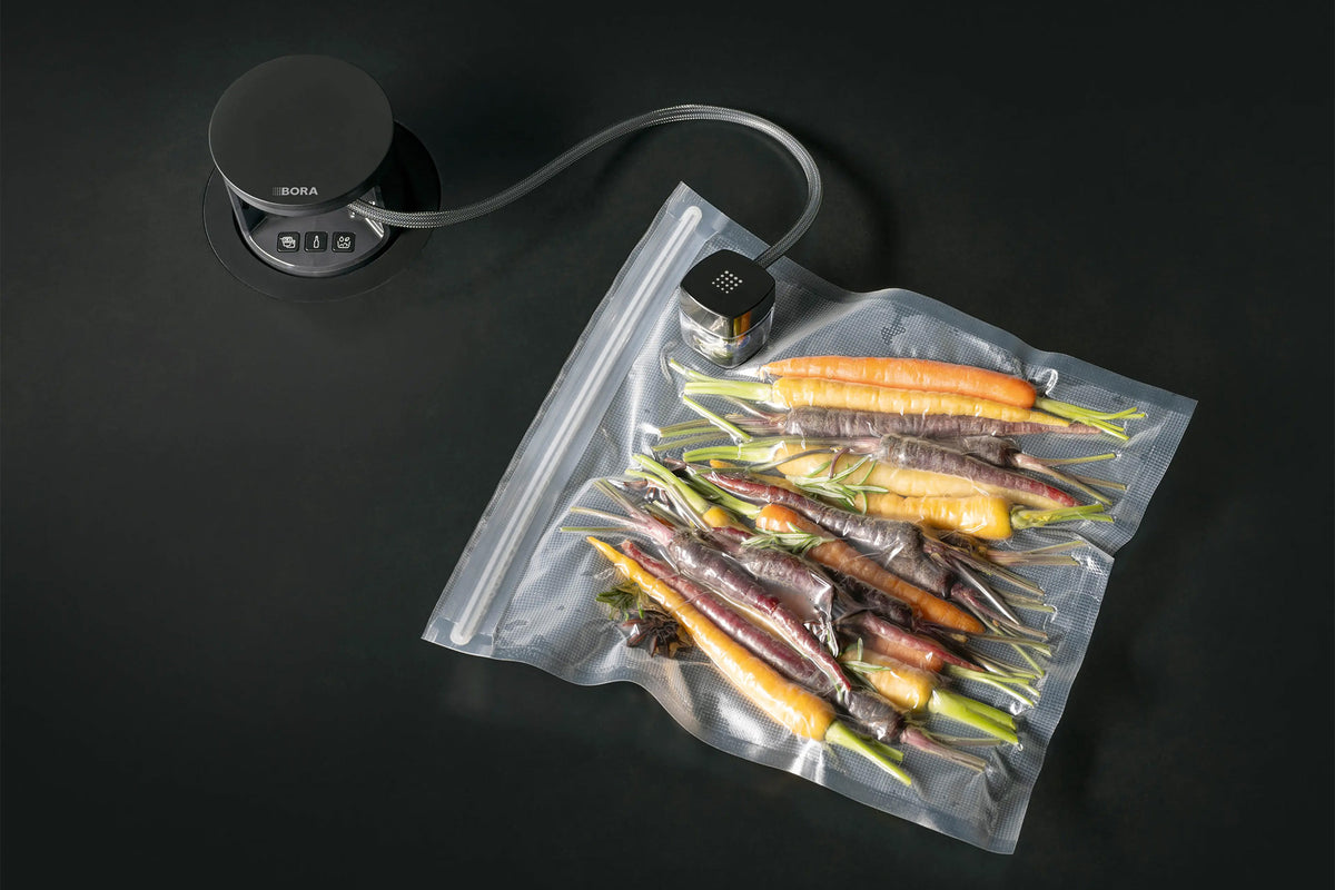BORA QVac Vacuum Seal Bags QVACVBE2 - in-use shot with food vacuum-sealed inside medium bag