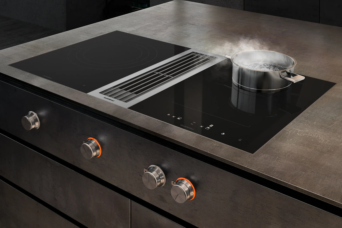 Gaggenau 400 Series Vario Downdraft Extractor VL414115 - in-use shot with extraction active next to hob modules