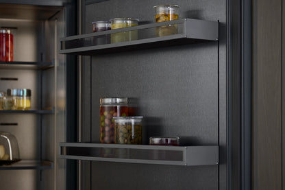 Gaggenau Expressive Series Vario Fridge RVC497190 - interior detail showing LED lighting and glass shelves loaded with food