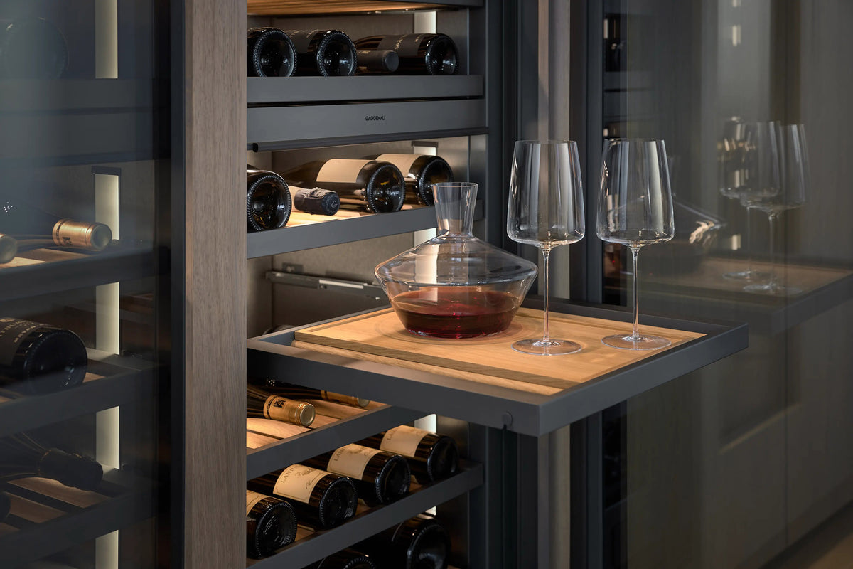 Gaggenau Expressive Series Vario Wine Climate Cabinet RVW467170 - interior detail showing wooden wine shelving and bottles