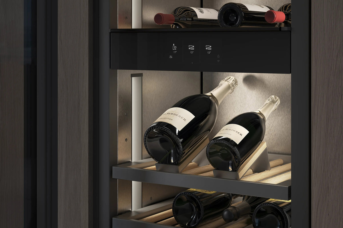 Gaggenau Expressive Series Vario Wine Climate Cabinet RVW467170 - in-use shot with wine bottles stored on wooden shelves
