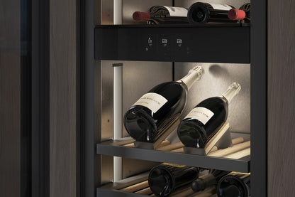 Gaggenau Expressive Series Vario Wine Climate Cabinet RVW467170 - in-use shot with wine bottles stored on wooden shelves
