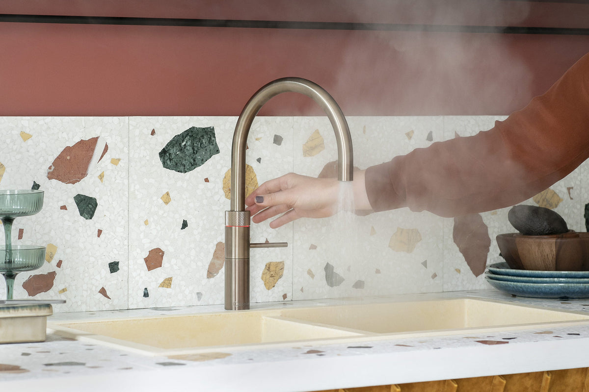 Quooker Fusion round boiling water tap in patinated brass